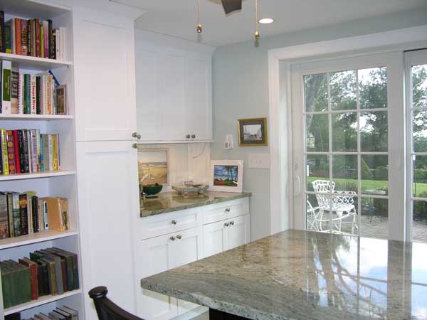 Opened up space with glass doors leading to patio