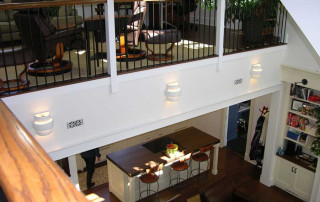 View from loft overlooking the kitchen and living room