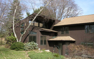 New Living Room addition – the roof overhang above the high clerestory windows was designed to block the high summer sun, yet allow the lower winter sun to warm the room