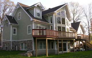 Rear Elevation – walk-out basement with first floor deck above