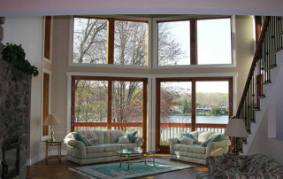 View from front entry looking through living room and out to lake