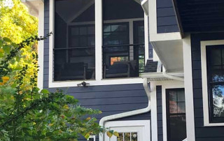 Rear Screened Porch behind the new art studio above the garage