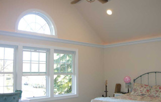 Master Bedroom with vaulted ceiling and large windows