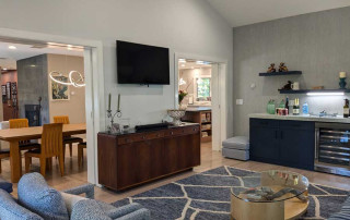 View from sunroom back into the dining area and kitchen