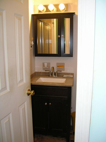 original bathroom with small vanity