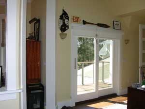 Large glass-paned doors provide more light