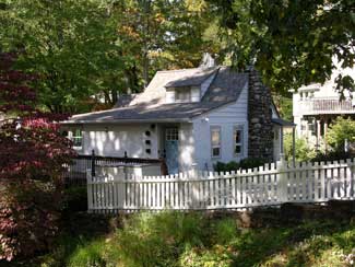 Same view of the log cabin after.