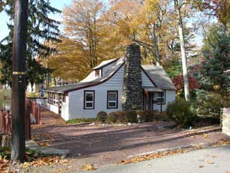 A view of the left side of the log cabin before