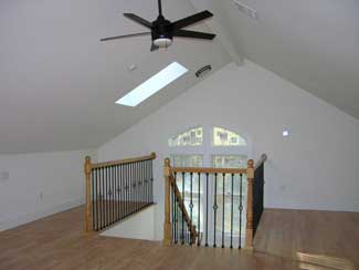 vaulted ceiling over stairway to "attic"